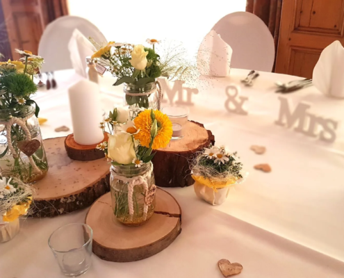Tischdeko mit Holzscheiben