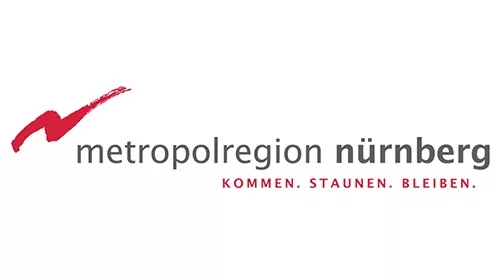 Logo metropolregion Nürnberg, in schwarzer Schrift, und einen roten Strich oben links in der Ecke